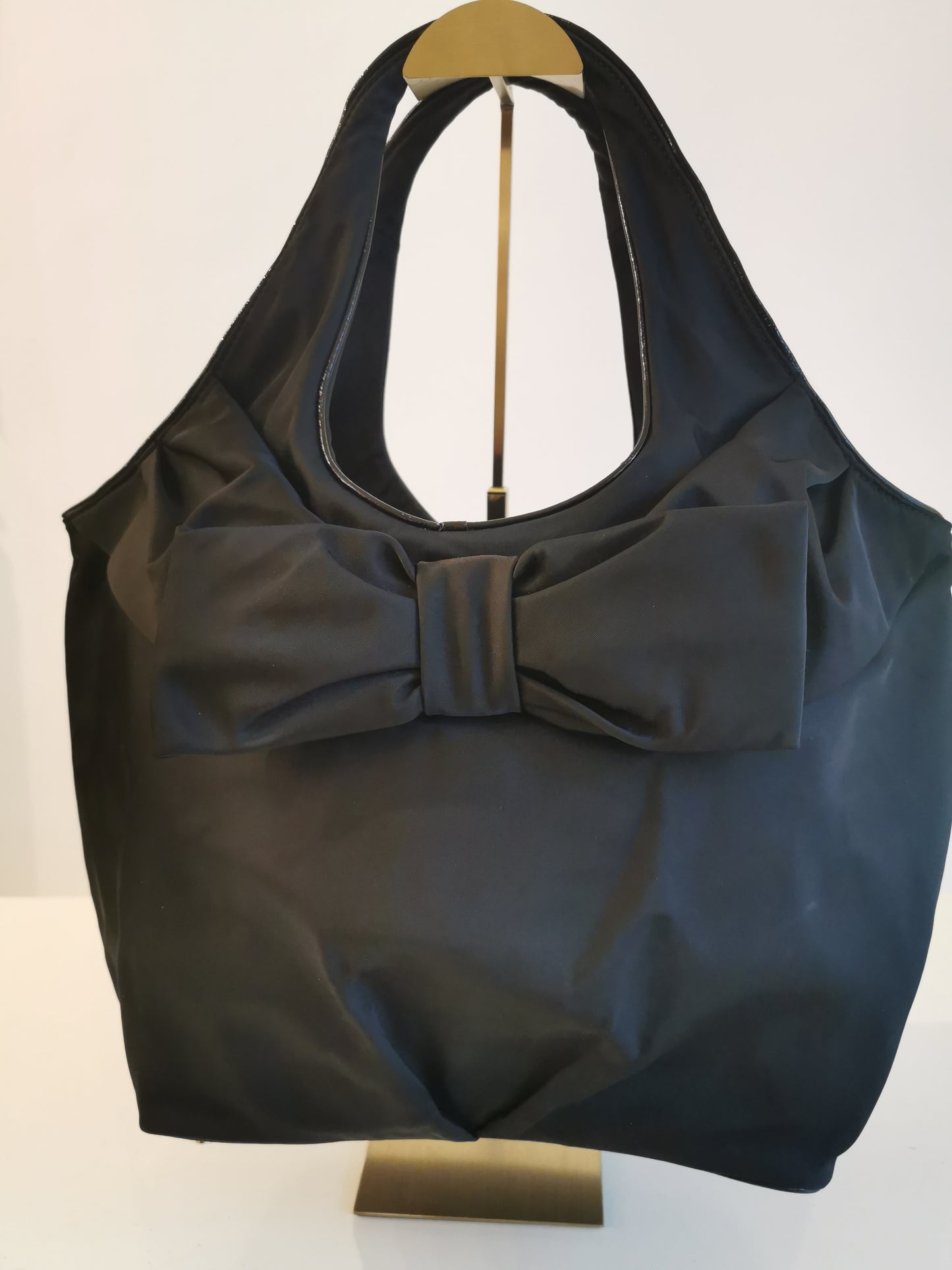 #10 – Kate Spade Black Nylon Tote with Bow